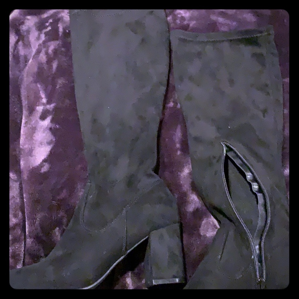 Diva black knee high boots.  No wear apparent.